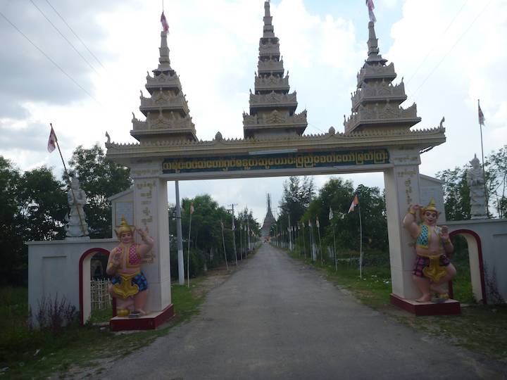 The ornate entrance to the buddist monastery.  The road was good near here!