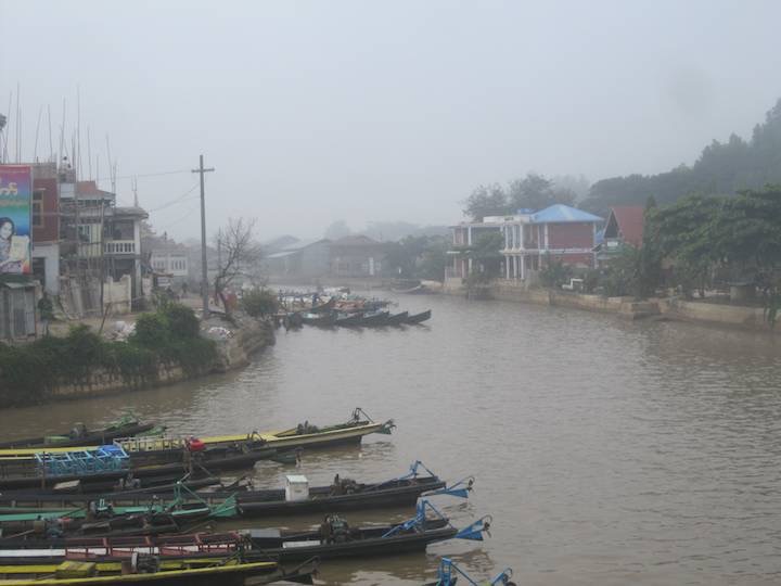 Leaving on a misty morning after 2 nights in Nyaungshwe. Our hotel is on the right of the canal.