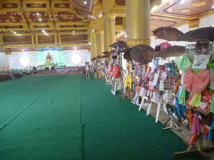 Then to Atumashi Kyaungdawgyi where it was interesting to see the gift stands people had made for the monks.  Apparently this was an annual ritual and gifts included everything a monk might need from soap to cooking pots and refrigerators and fancy folded money.