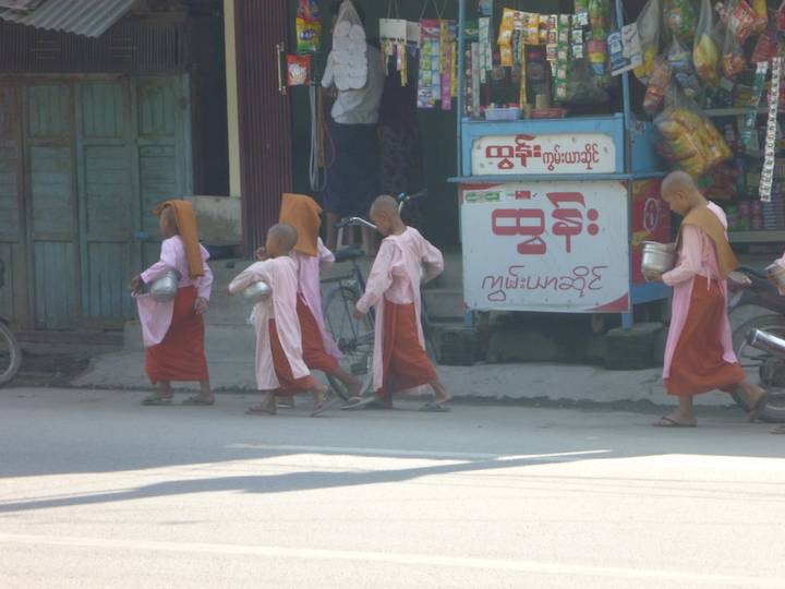 Lunch on 35th street and a group of young girl? monks go from door to door allowing people to give.