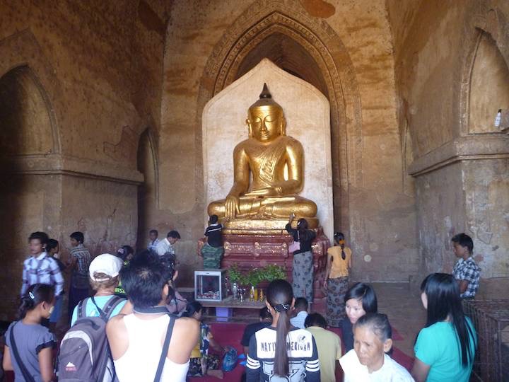 A huge golden Buddha with so much gold leaf applied that the feet are all knobbled. The gold leaf is applied to gain merit for the next life.