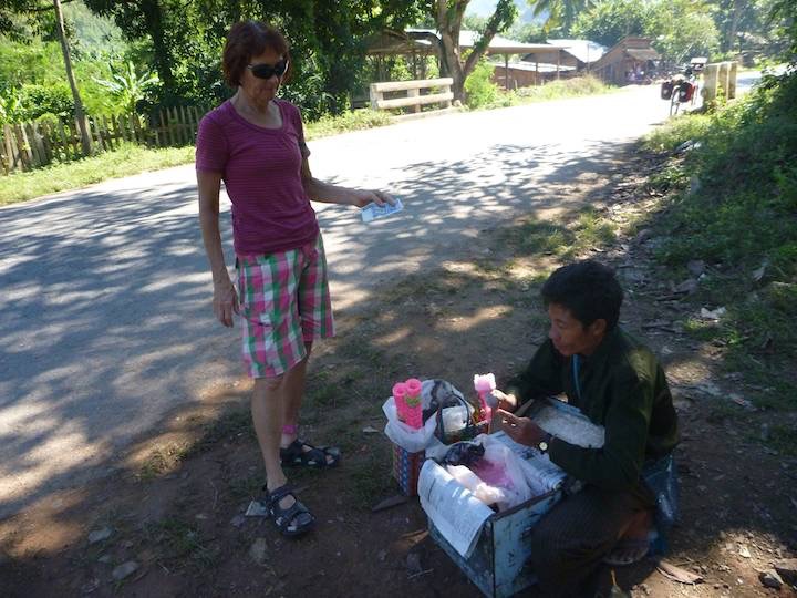 We stopped and bought an ice-cream from the vendor waiting outside the school.