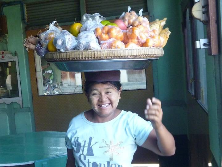 This lady&rsquo;s load was too heavy for her to lift alone, but once on her head she was quite happy.