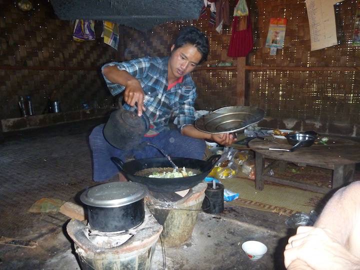 A guide &ldquo;Doon Ding&rdquo; cooking our lunch in the separate cooking hut.