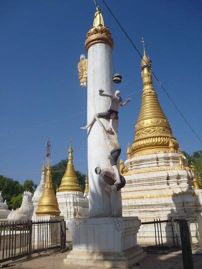 This concrete pillar with 3 animated figures climbing took my fancy. 