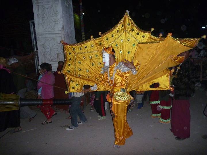 This man led a gonging musical troop into the festival, monastery grounds.